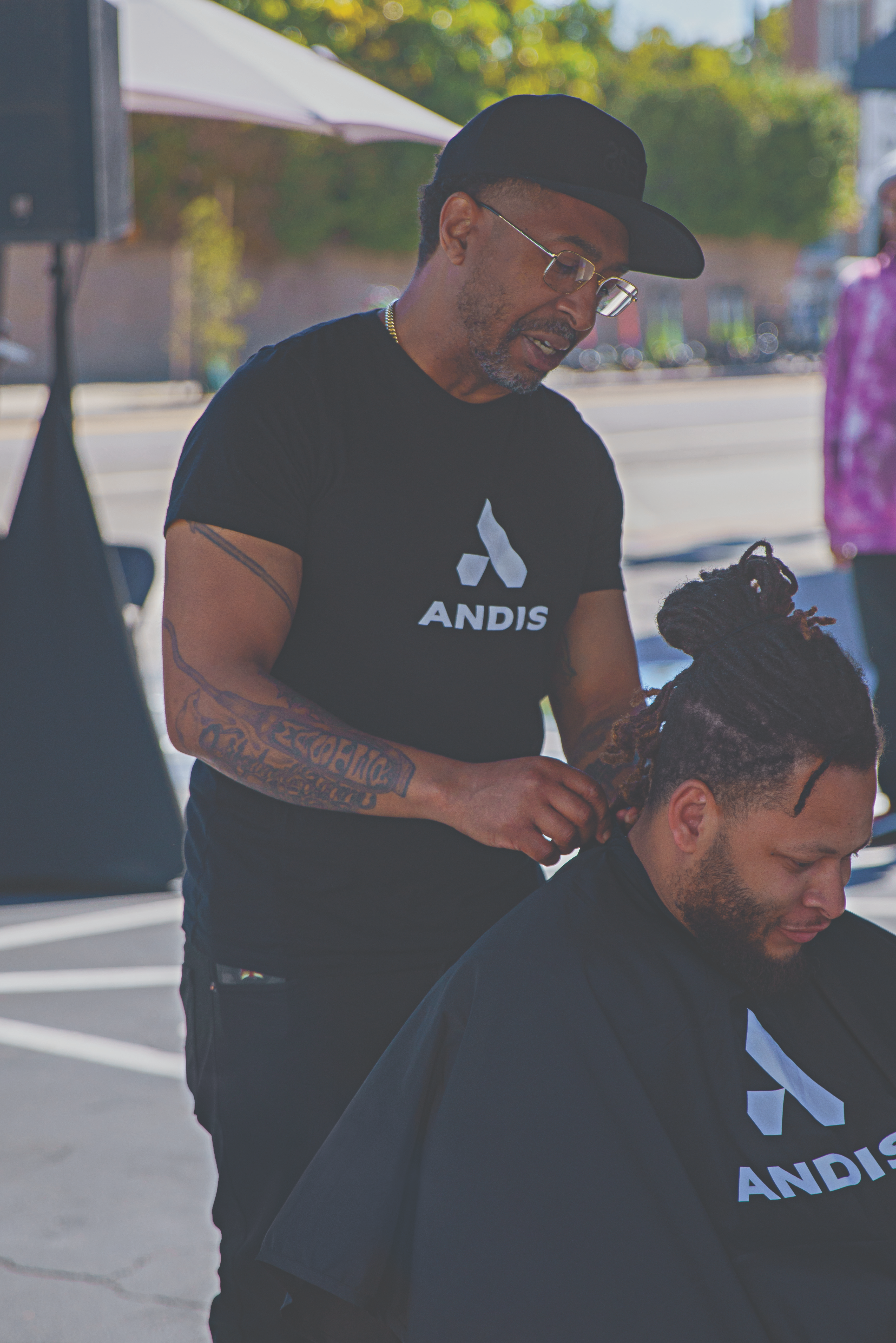 Brighter Community Venice Beach barber trimming hair